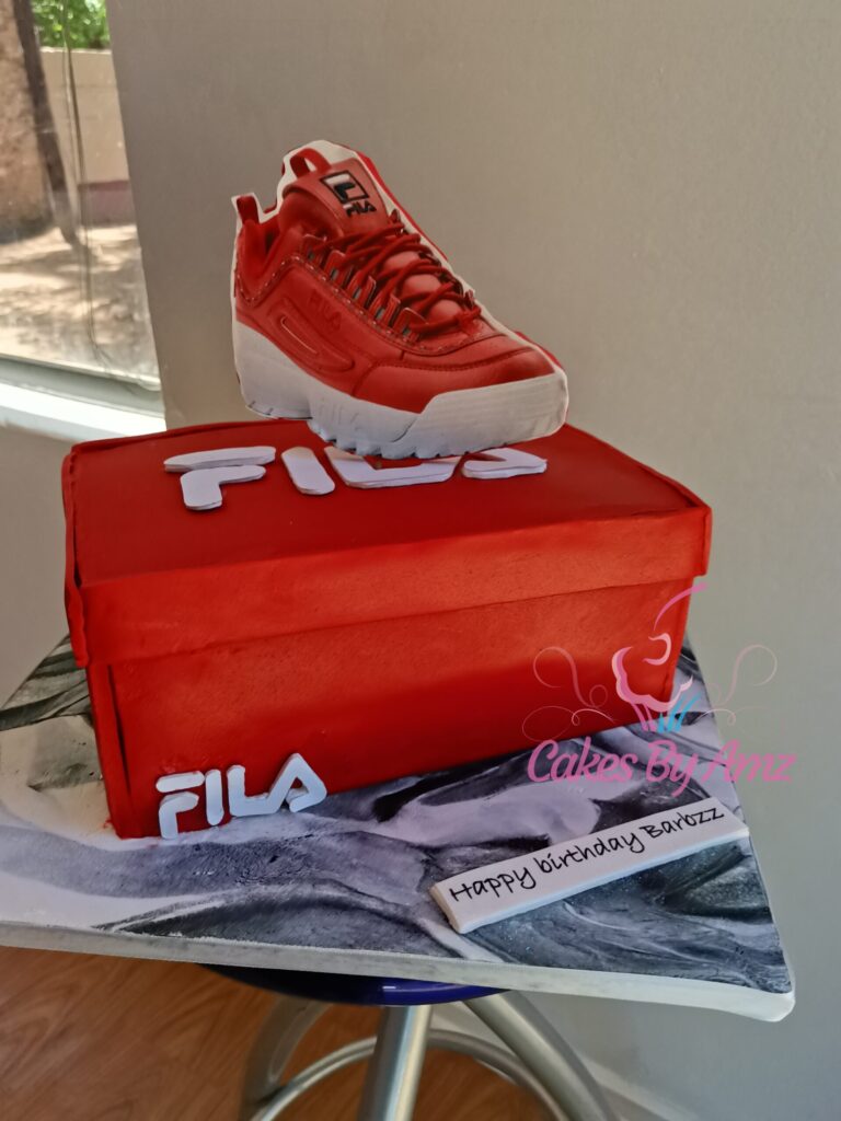 Red FILA sneaker and shoebox novelty cake