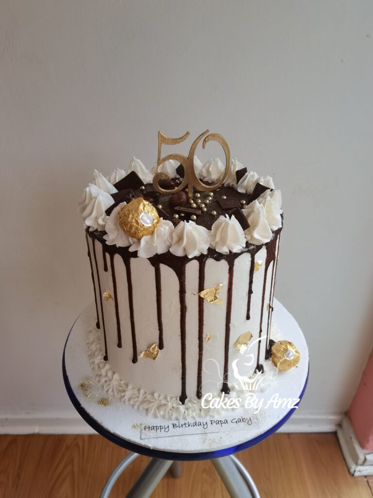 Chocolate drip 50th birthday cake with Ferrero Rocher and gold leaf